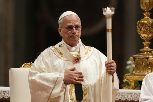Pope Leo XIV leads the Easter Vigil inside St. Peter's Basilica at The Vatican, Saturday, April 4, 2026. (AP Photo/Andrew Medichini)
